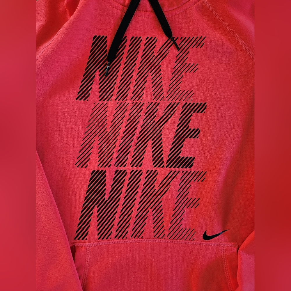 Nike Neon Pink Hoodie with thumb holes.